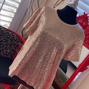 Women s Micro sequin peach t shirt by DKNY .
